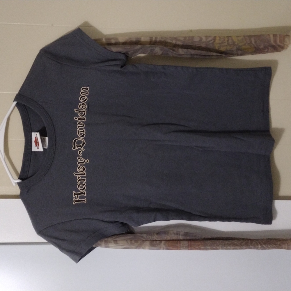 Tattooed sleeve Harley Davidson shirt